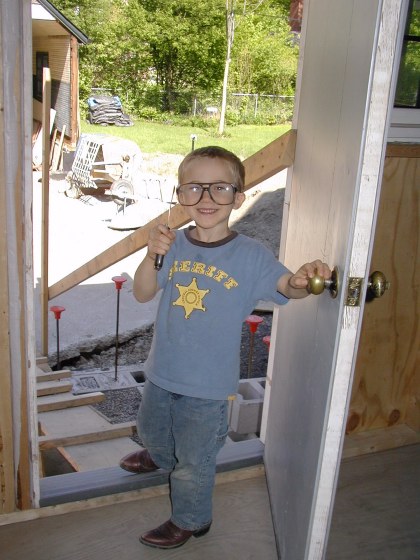 Safety first as Ian prepares to use a sharp scrapping tool