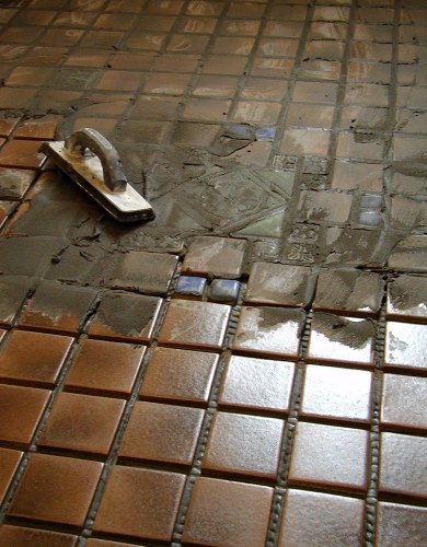 Grout work begins