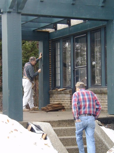 Mike attaches pergola pillar wraps