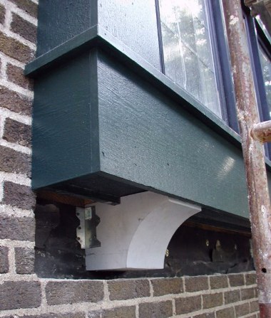 One of two decorative brackets under new kitchen window.