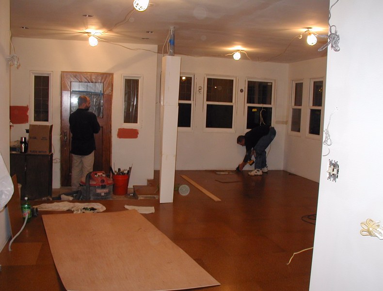 Brian and Shaun installing 24 x 24 Expanko tiles