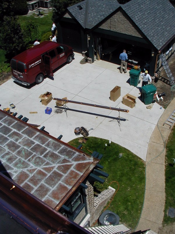 Sarnia Cabinets shares driveway with gutter installers. Home owner observes