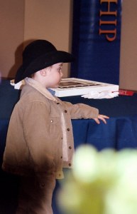 'A cowboy gets to drag'n after a long day on the trail.'