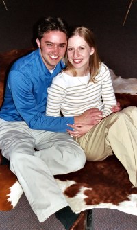 Surrounded by wedding preparations, Tom and Sarah find a spot to relax on the hide