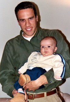 C.J. is the picture of contentment with Daddy