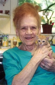 Mr. Kitty comes to live with Jackie