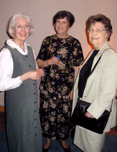 Greeting friends and neighbors...
         Carol with Mary and Elaine