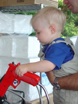 Daddy shows Tyler how to do it
