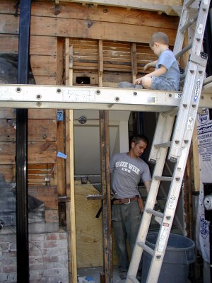 Overseer in position as Keith demos basement door